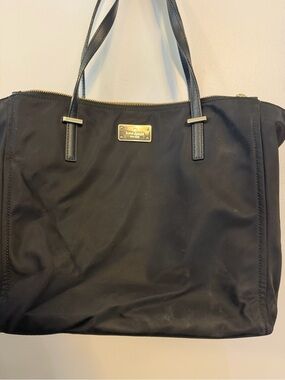 Kate Spade black tote with gold-plated logo plaque